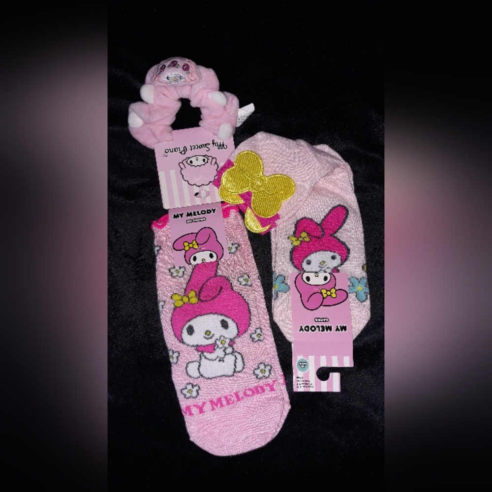 Sanrio 3 piece Bundle 2 pairs of sock and a scrunchie New with tags